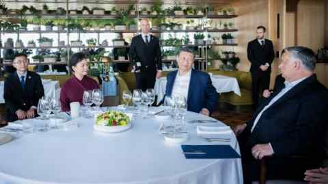 Hungarian Prime Minister Viktor Orbán at a restaurant table with Chinese President Xi Jinping and his wife