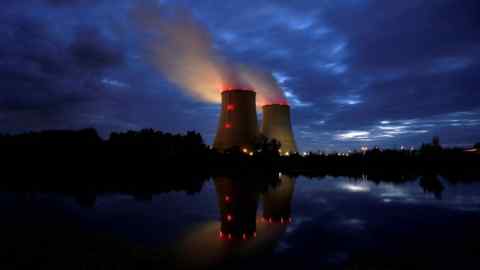 Steam rises from cooling towers at a nuclear power plant in Belleville-sur-Loire, France